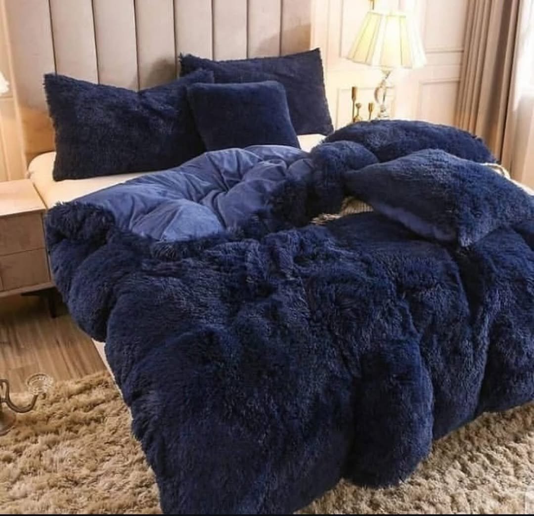 Luxurious bedding with faux fur or satin elements