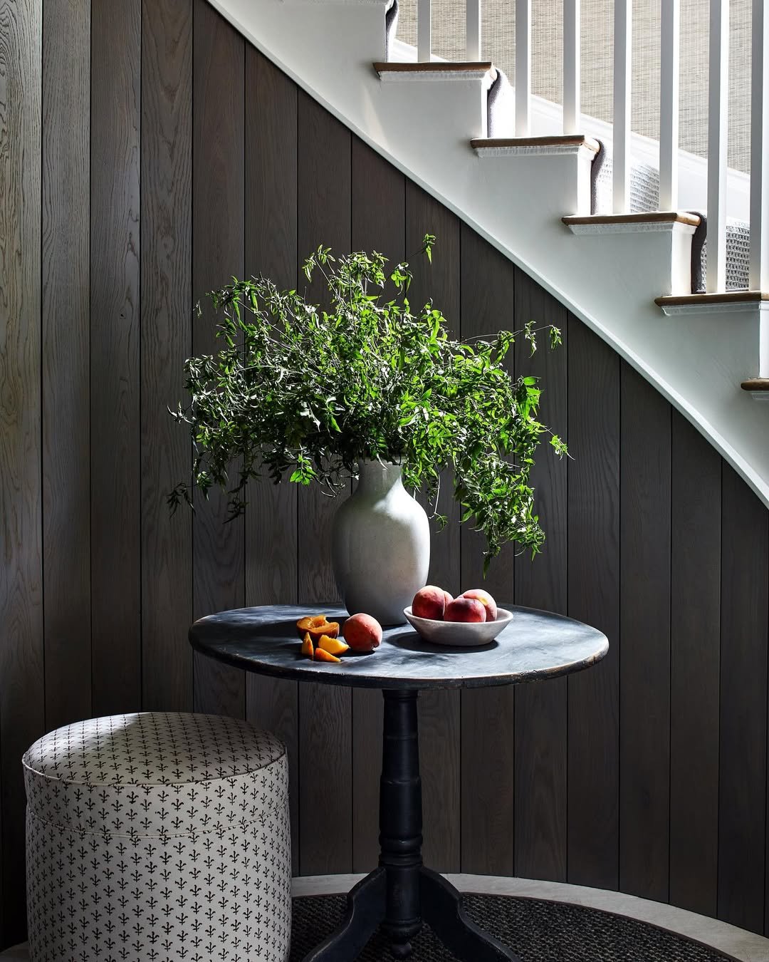 Black Wall with Nature-Inspired Decor
