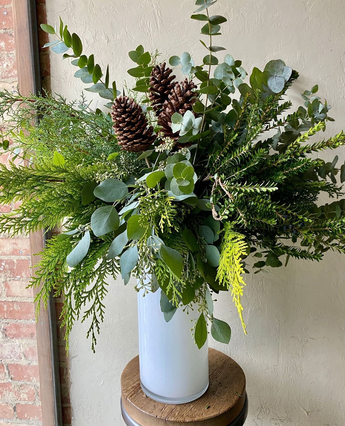 Succulents with Pine Needles with Winter Floral Arrangements
