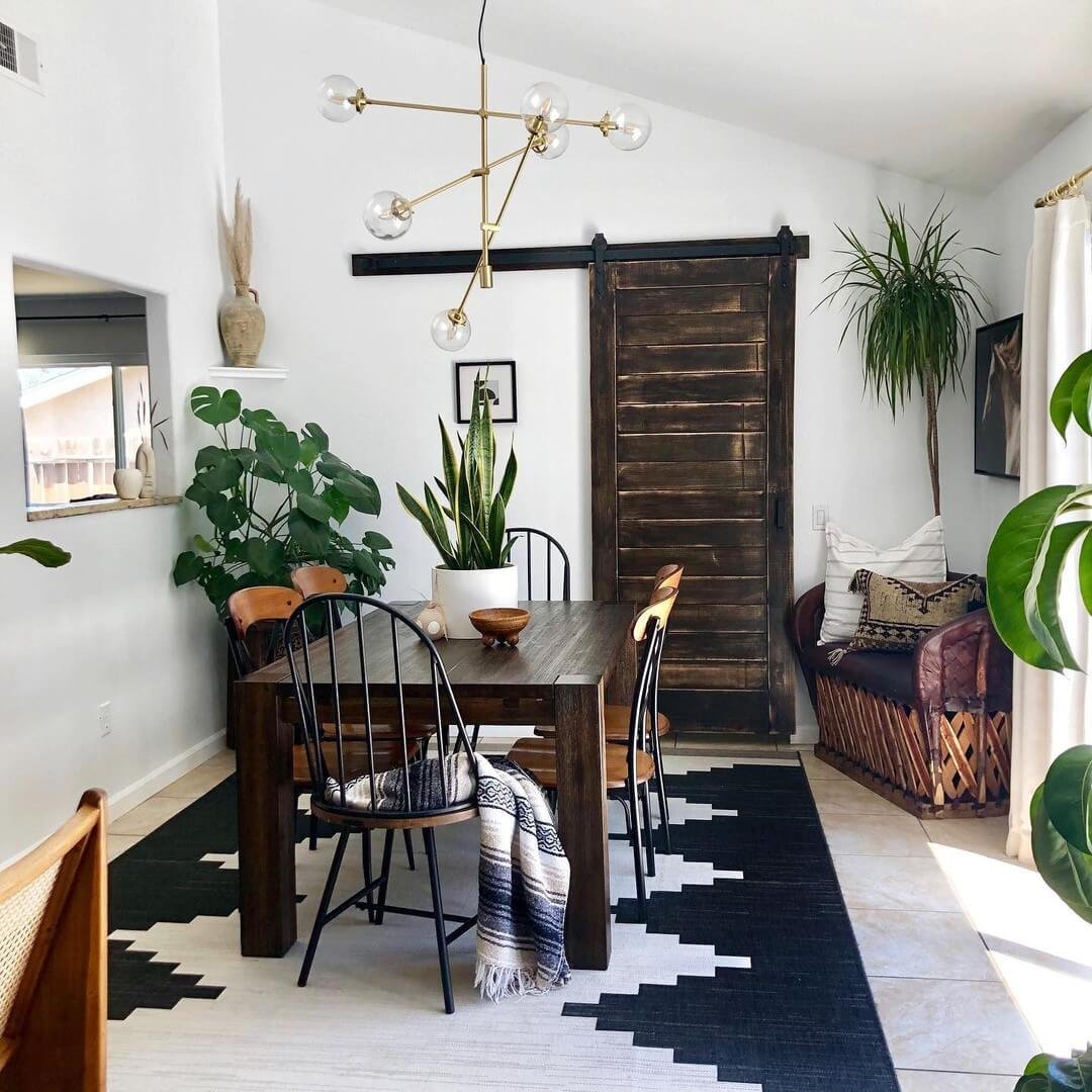 Layer Texture with Plants and Bold Lighting Small Dining Room